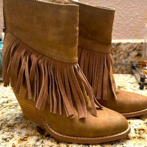 Tan leather ankle boots with fringe